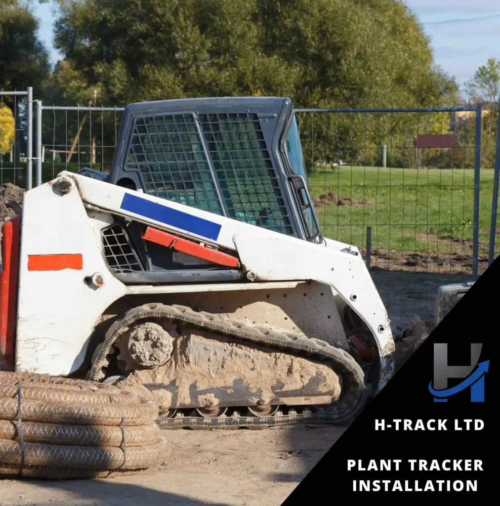 White mini Bobcat construction vehicle on a road with blue skies having plant Tracker Installation by H-Track Ltd