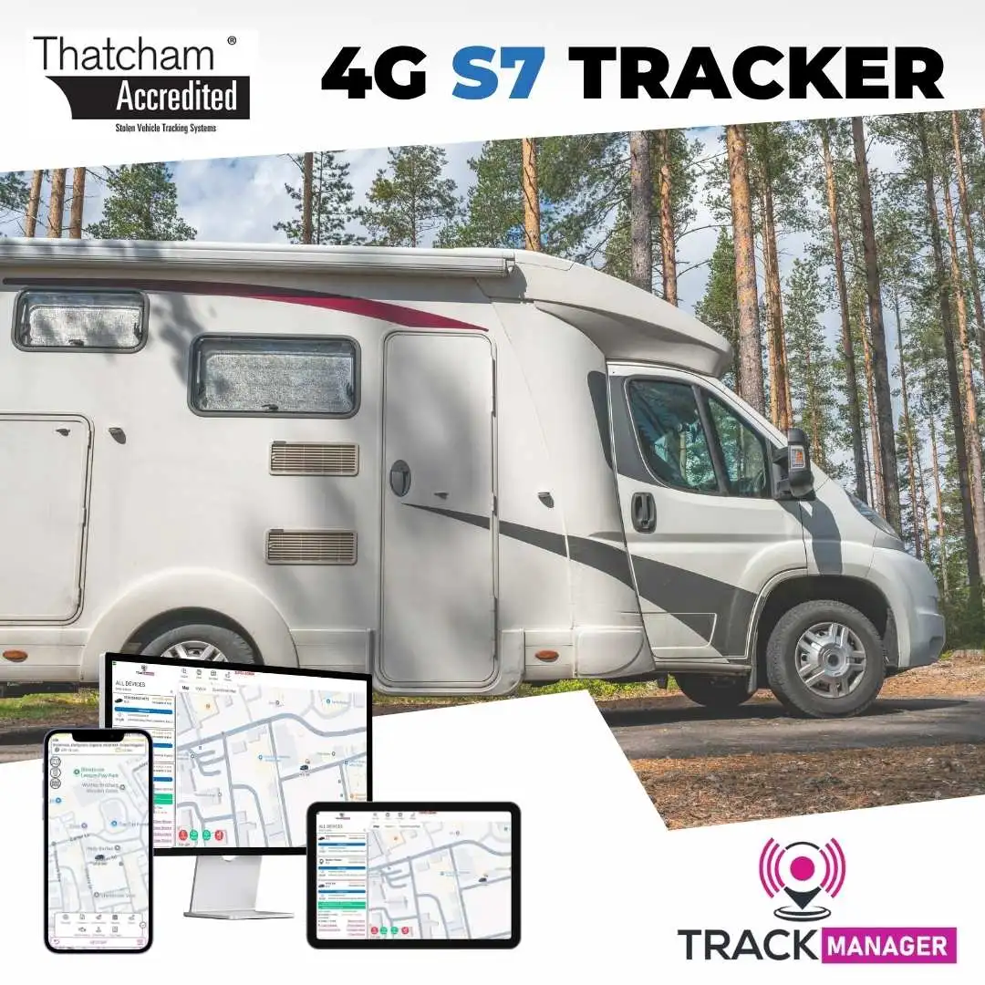 White Motorhome parked in forest trees highlighting Thatcham Approved S7 Tracker and immobiliser bundle by H-Track Ltd